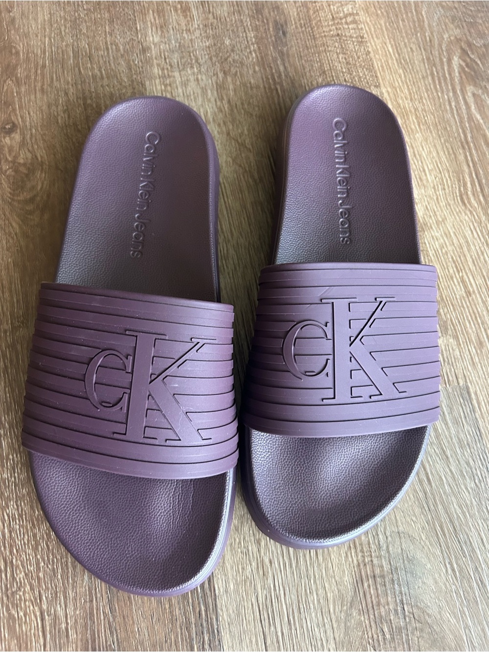 Calvin Klein Jeans Plum Embossed CK Slide Sandals